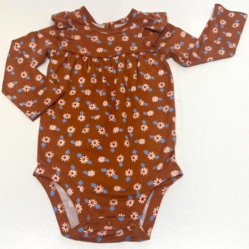 Carters dressing baby